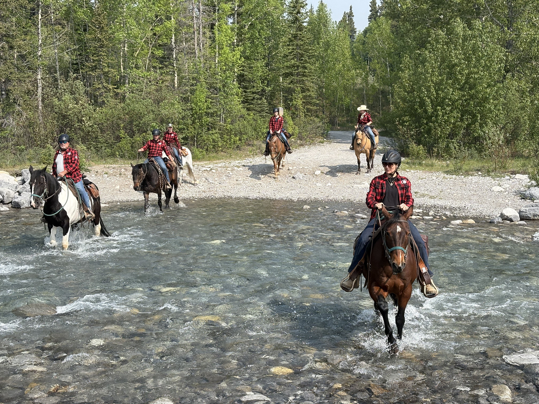Six Soldeir On members riding horses during a horsemanship camp this summer.