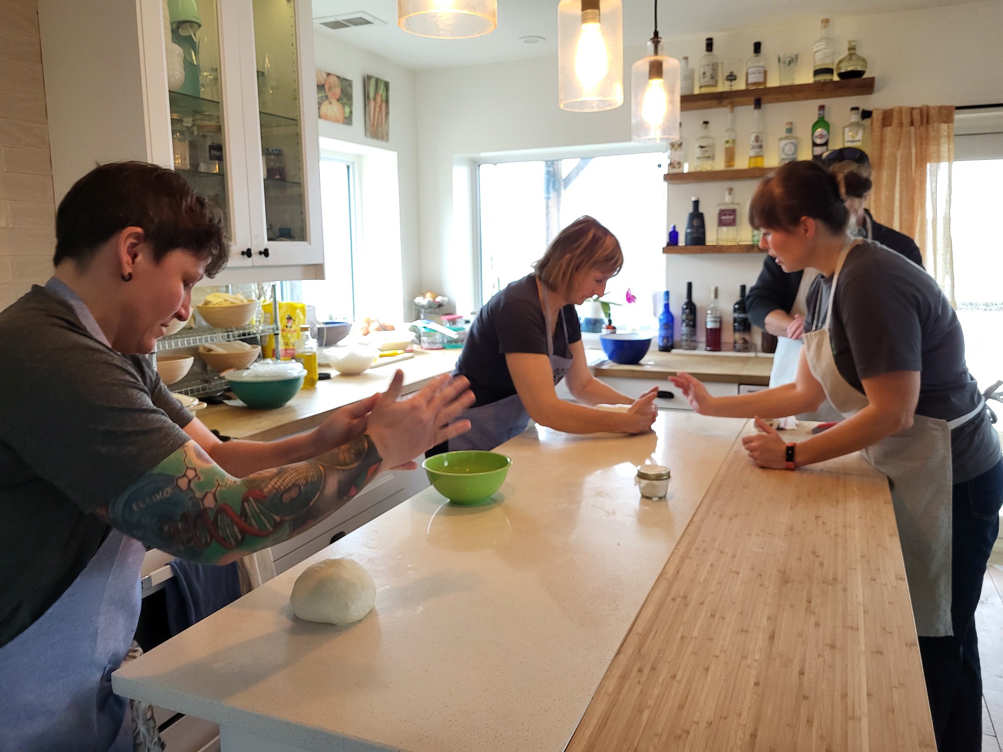 Soldier On members making bread dough during a baking class session
