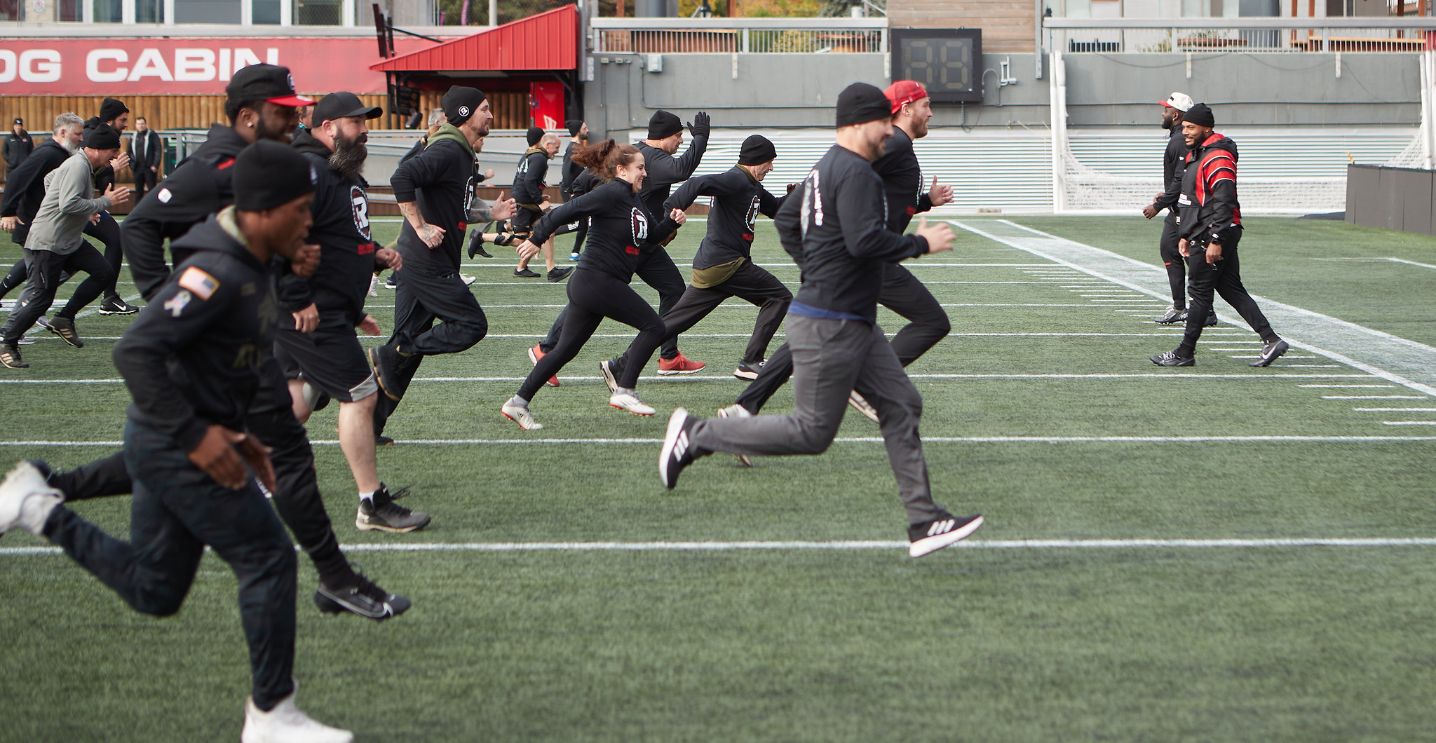Soldier On members learning food ball drills at the Ottawa Redblacks' home court.